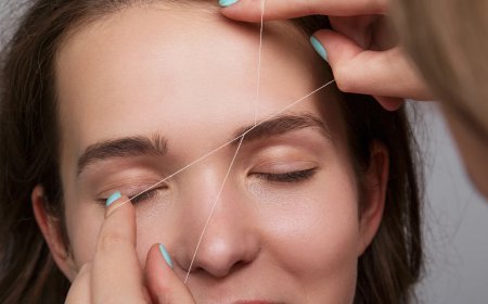 Коррекция бровей нитью